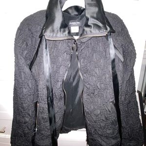 Very stylish and practical short jacket.